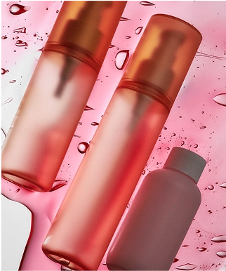 small pink spray bottles
