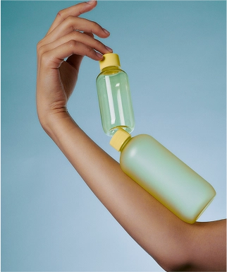 arm holding a bottle